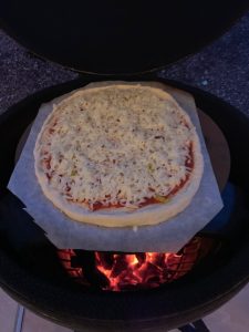 Pepperoni Pizza on Pizza Stone inside Big Green Egg